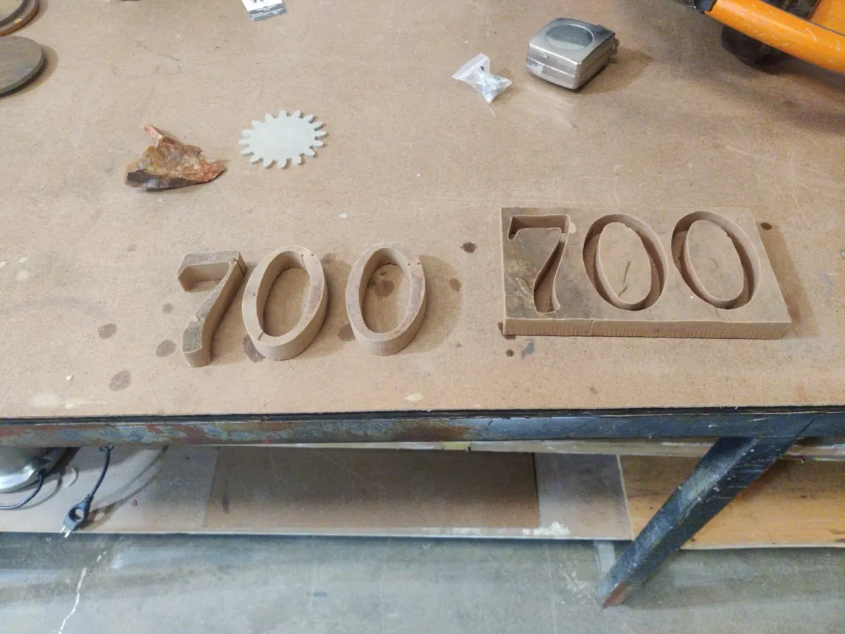 House numbers cut from natural sandstone